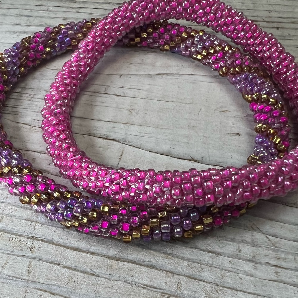 Roll on bracelets! Set of two. Pink, purple,gold. Lovely! New without tags. 😍